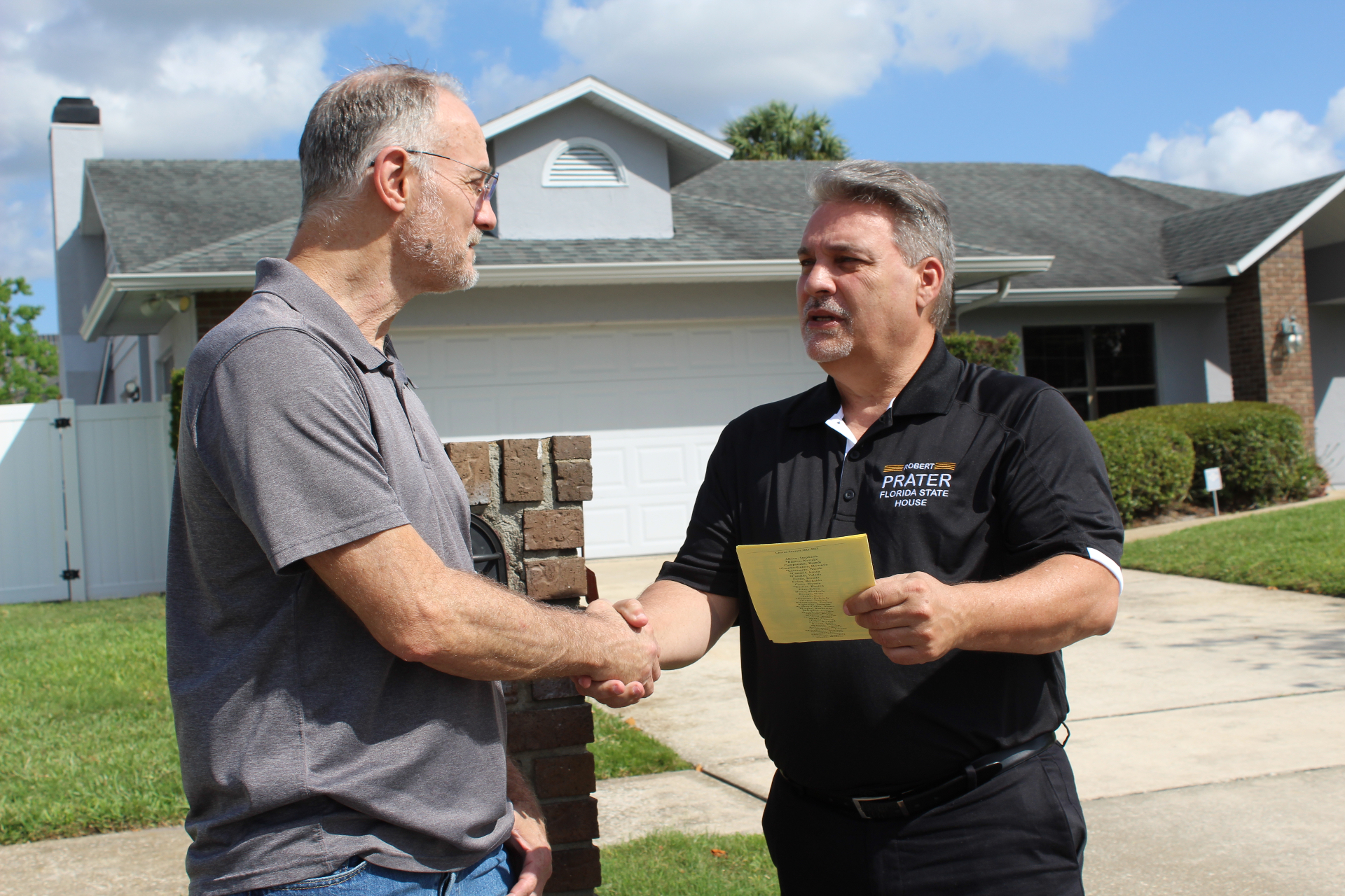 Rob Prater meeting with a neighbor in District 37